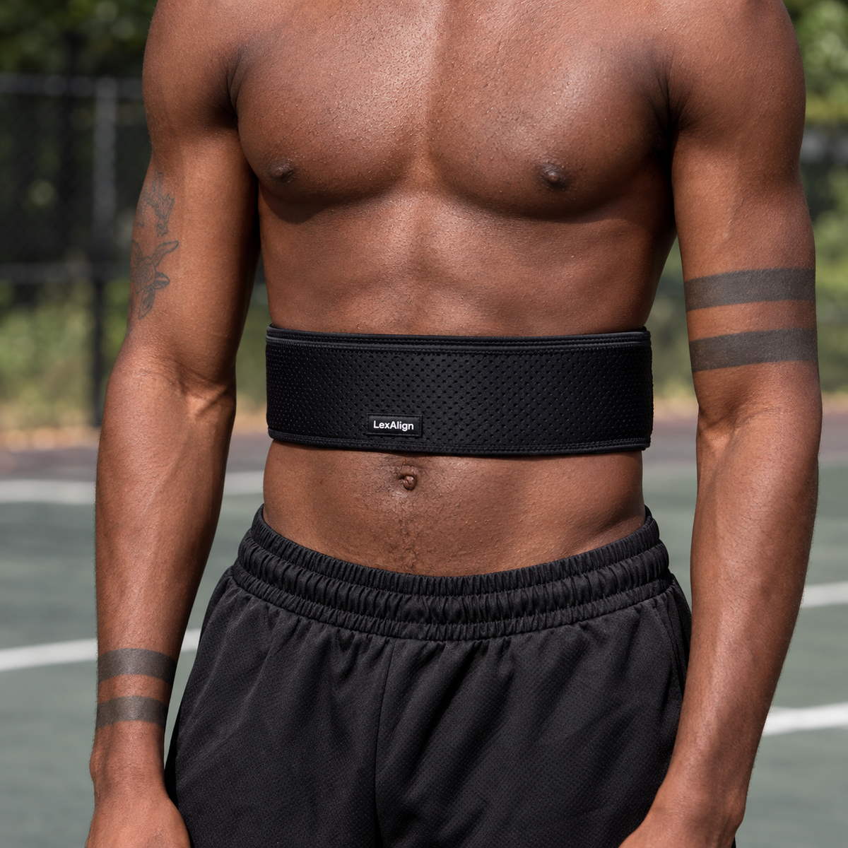 Close-up of the black LexAlign back support belt being worn
